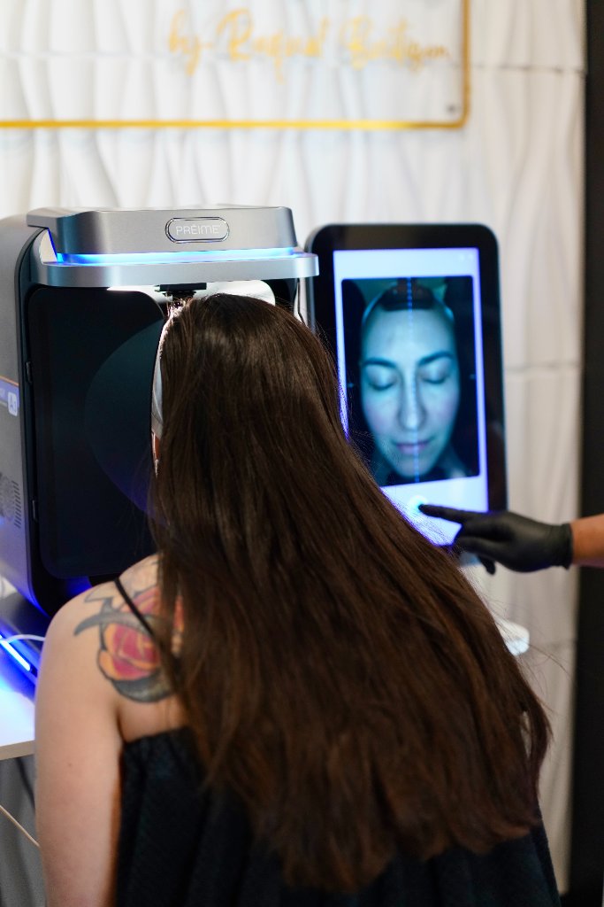 PRÉIME AI Skin Analyzer in use