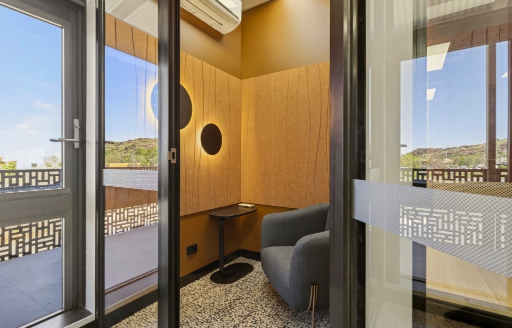 Glass-fronted focus pod with views to Karratha hills