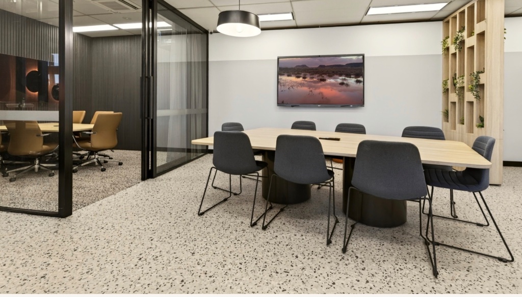 Boardroom — extended seating configuration, 10-person capacity