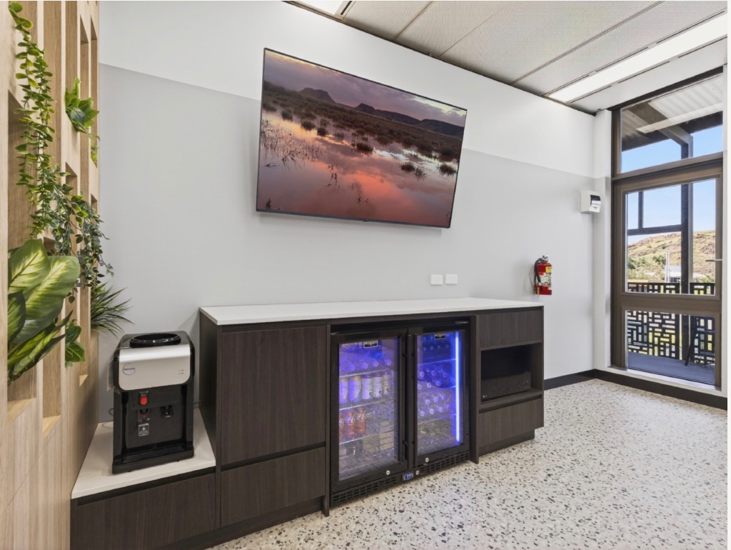 Open-plan work zone with booths, hot-desks and pod access