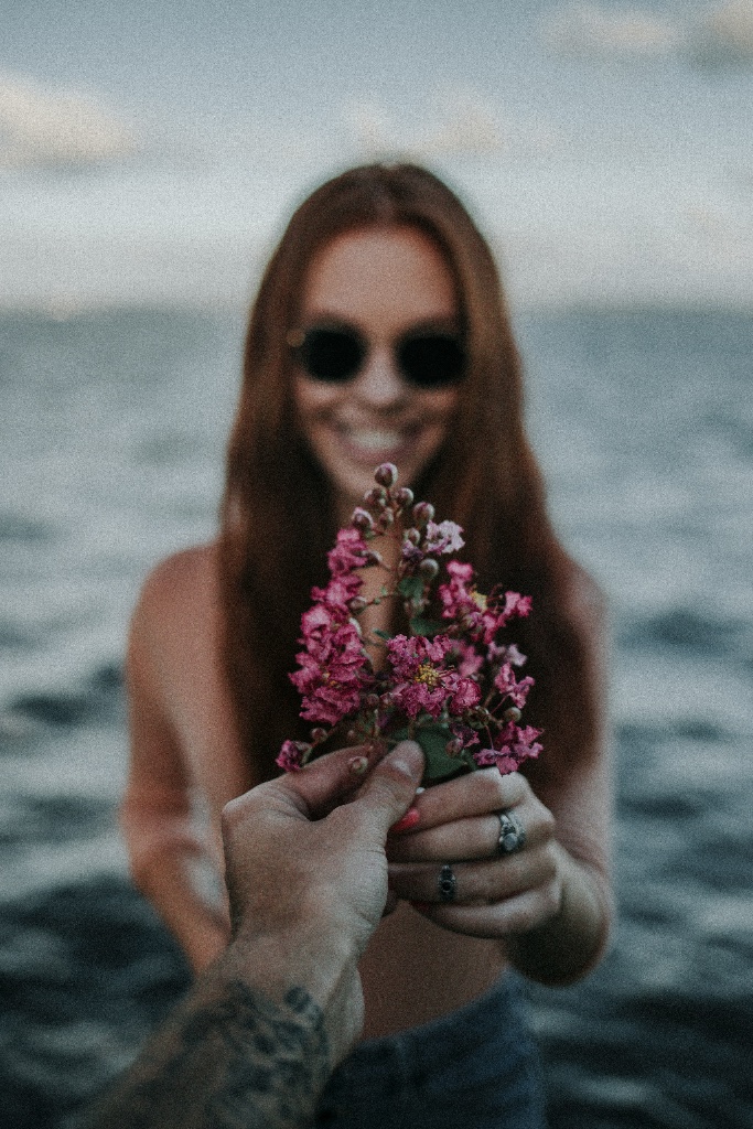 Woman offering flowers