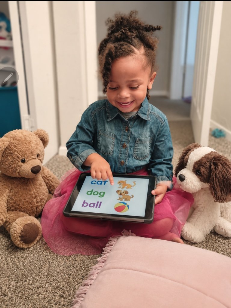 Child using tablet for learning
