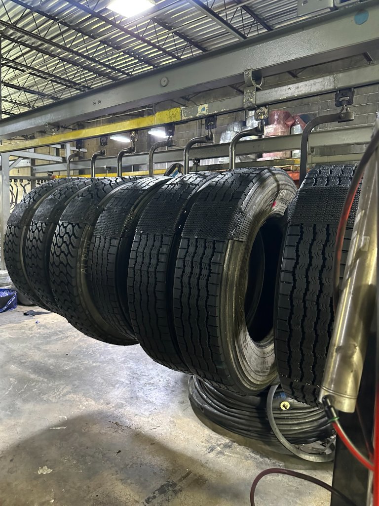 Tire Solutions technician repairing a commercial dump truck tire