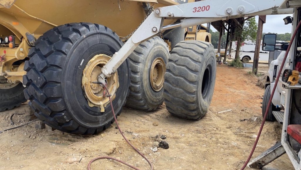 On-site heavy equipment tire replacement by Tire Solutions