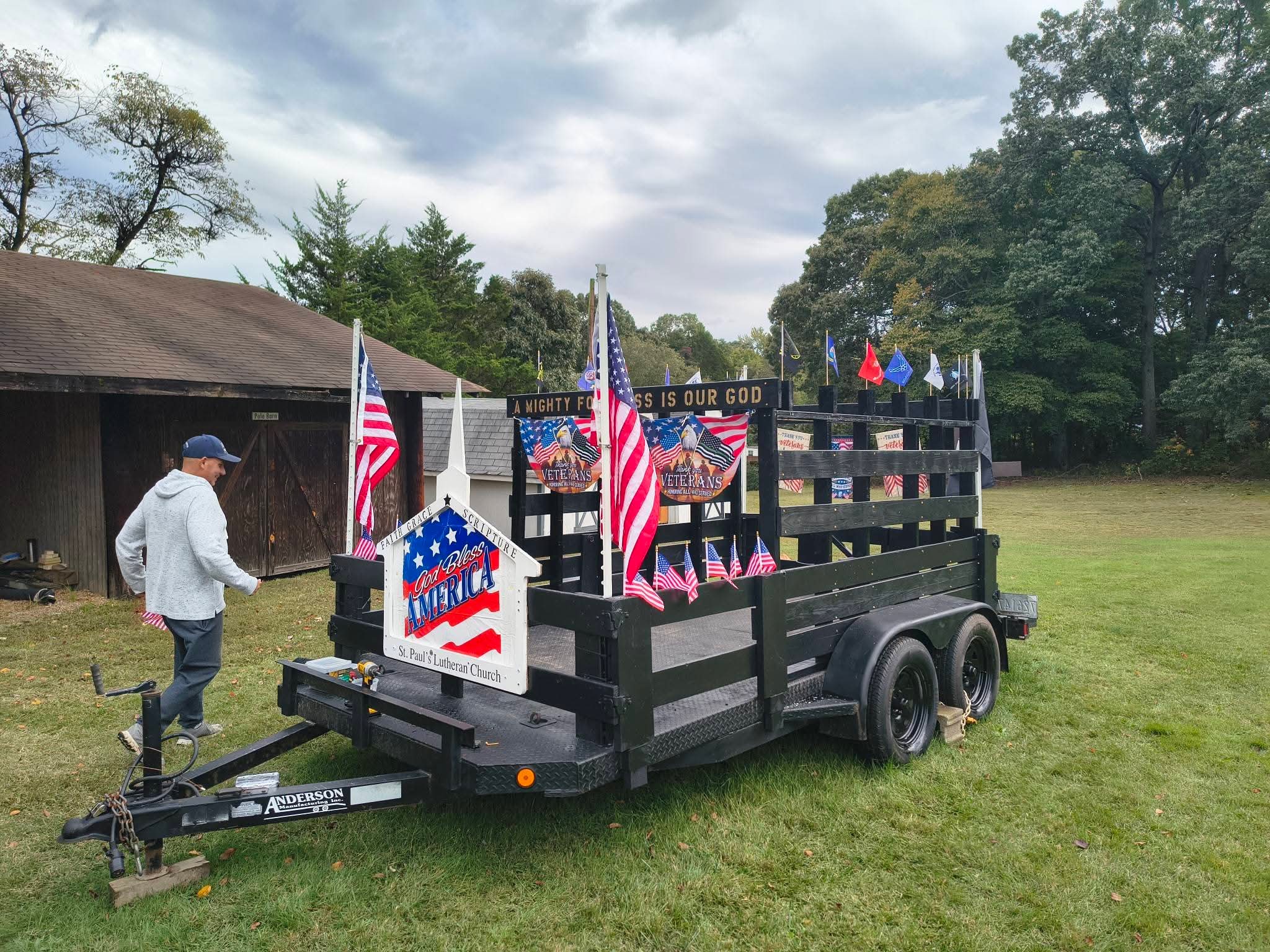 Side view of the finished float with the God Bless America sign