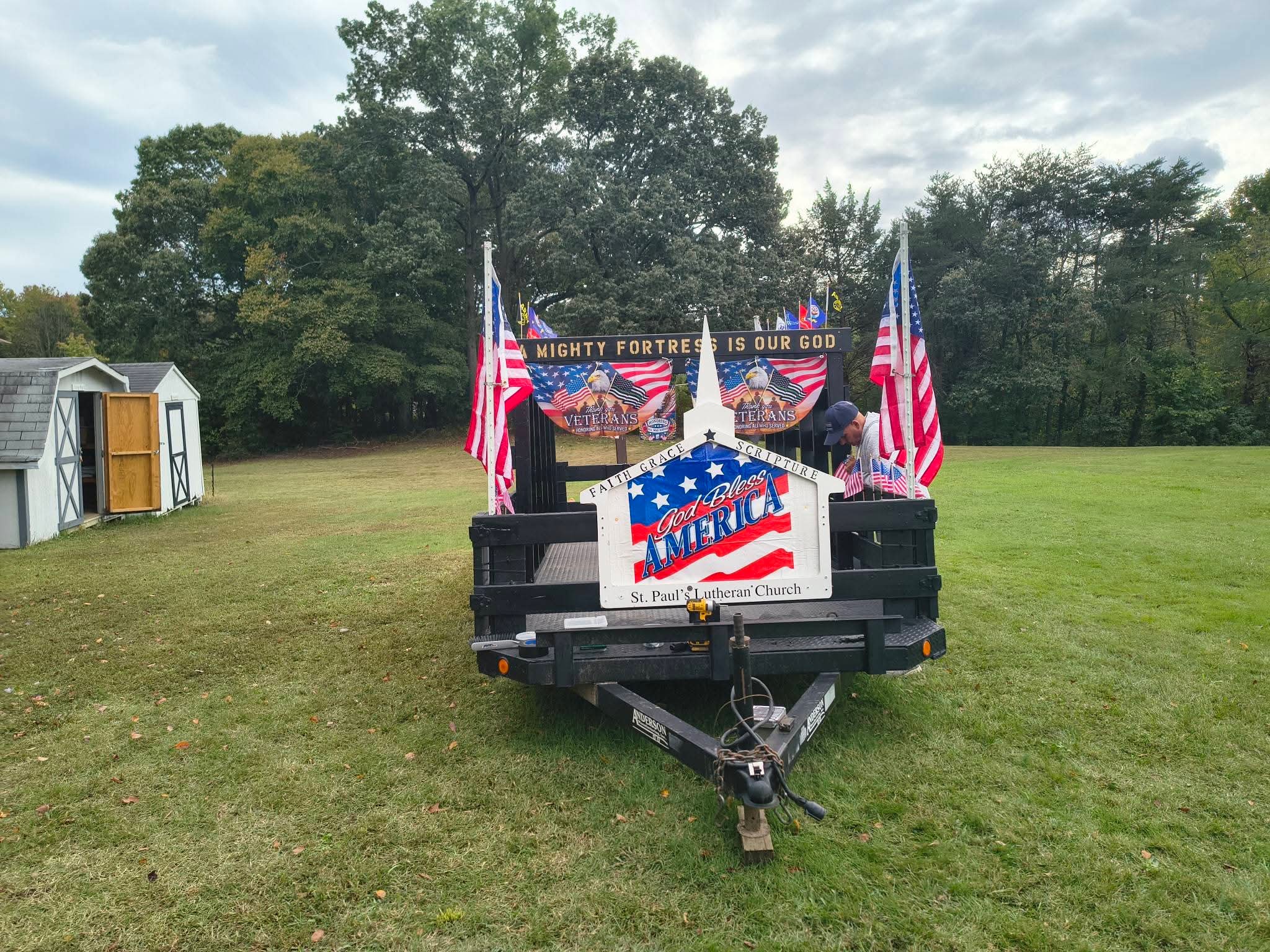 Front view of the float with American flags on each corner
