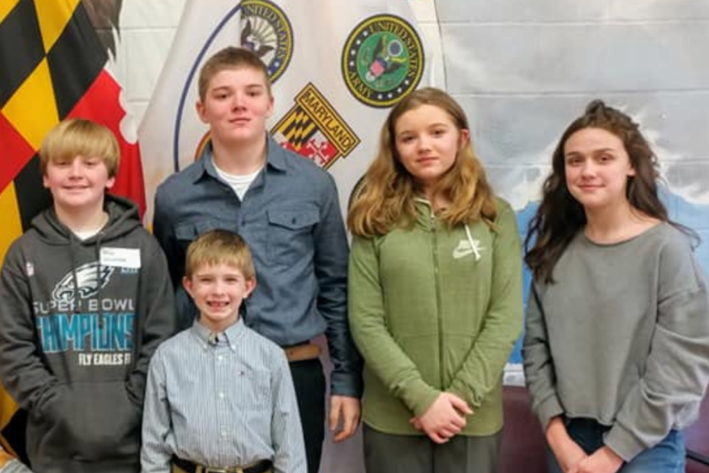 St. Paul's youth and volunteers serving the community through outreach