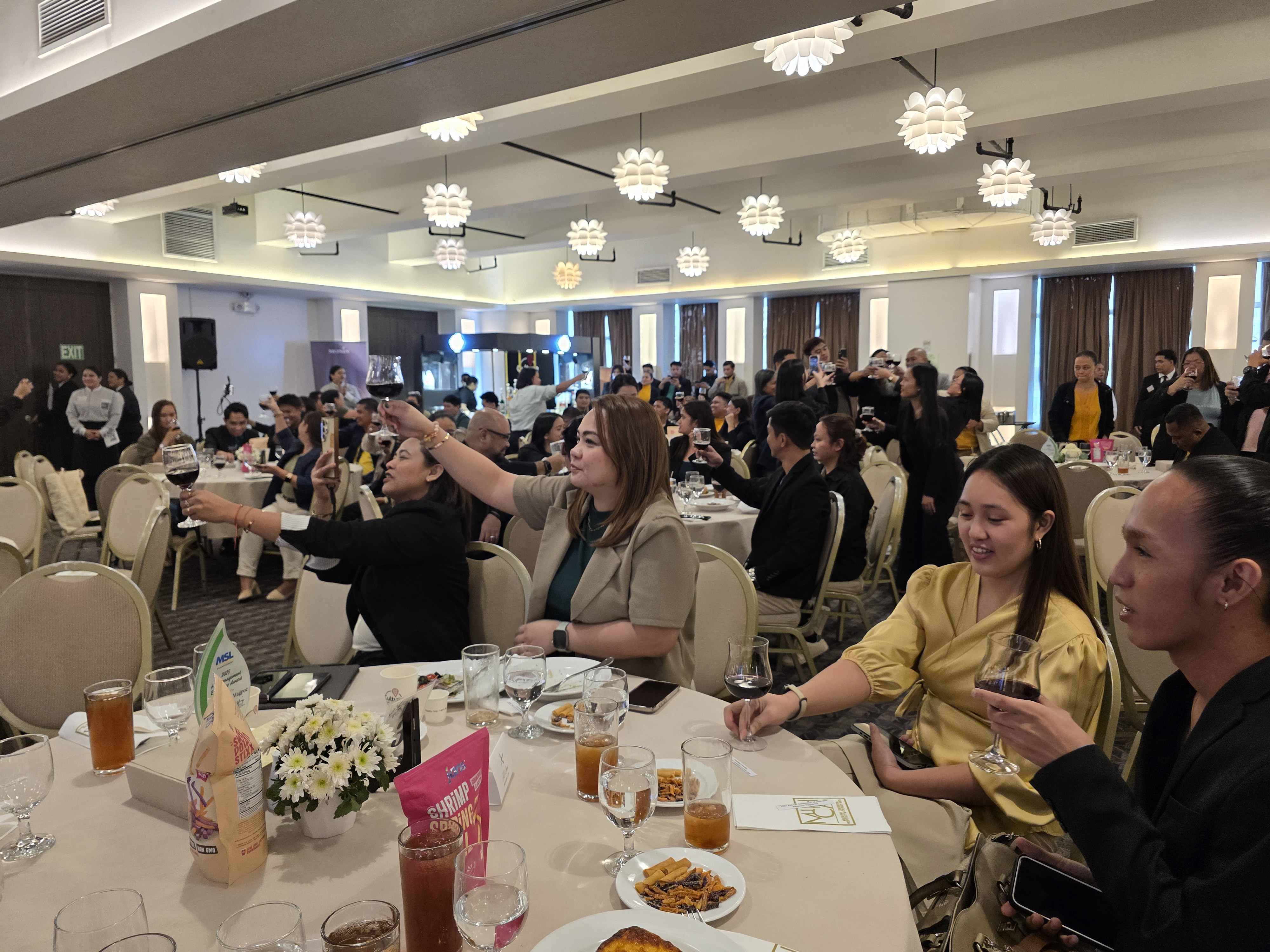 Team members raising a toast