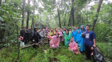 OSL MPs pose after their rainy tree-planting activity
