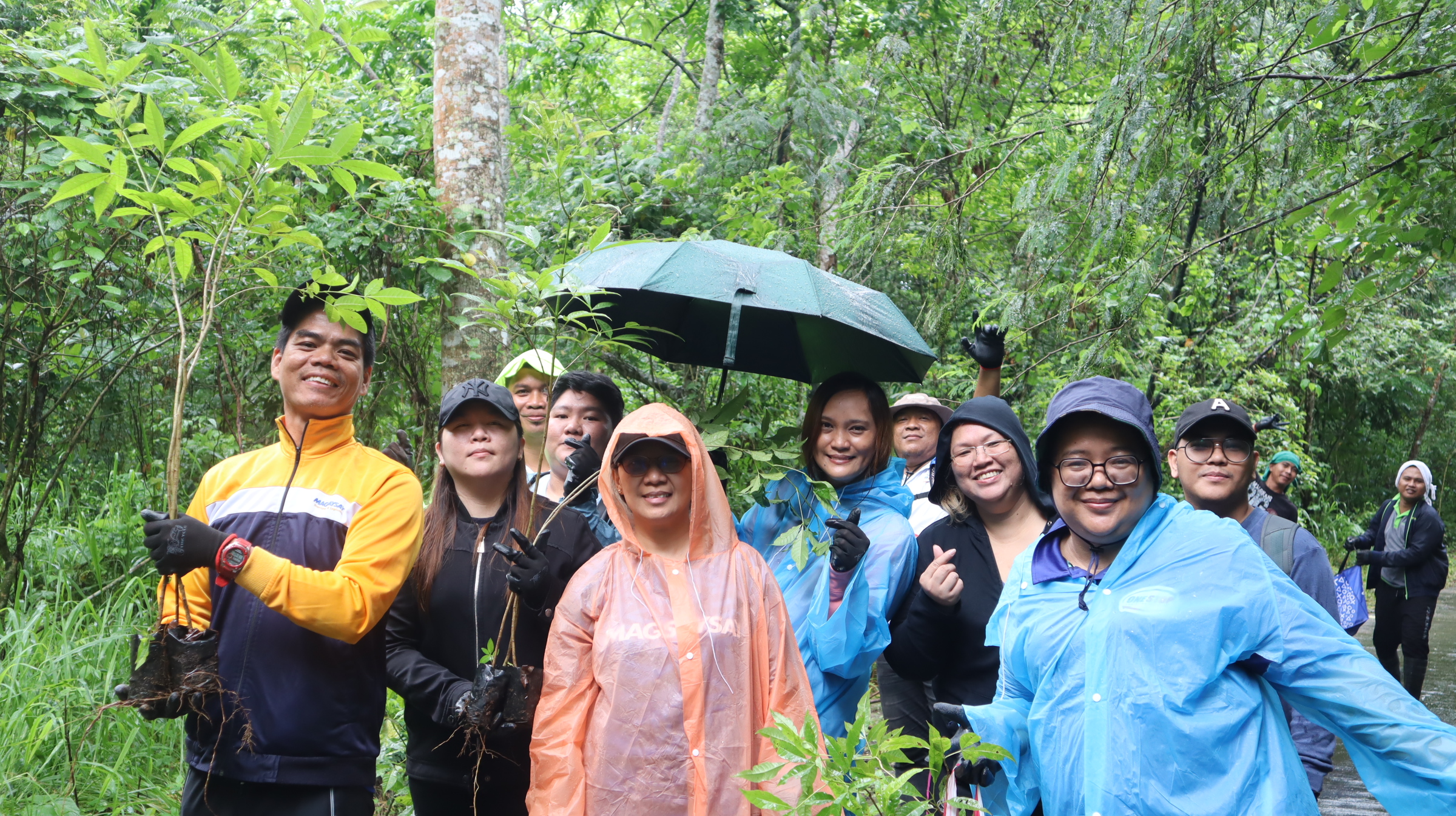 OLSI participants gather for the tree-planting activity