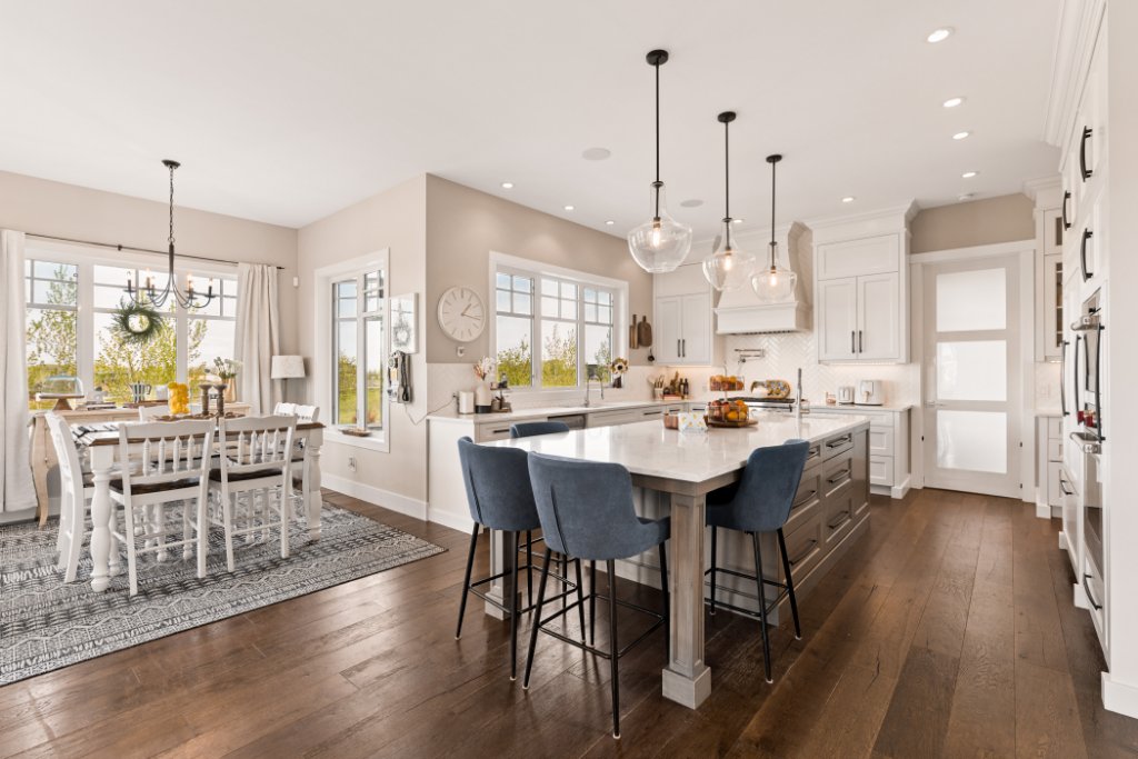 Entry foyer with soaring ceilings and hardwood floors