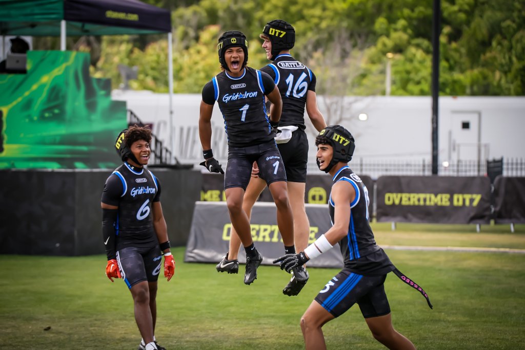 OT7 Nationals — Gridiron team celebrates after a big play