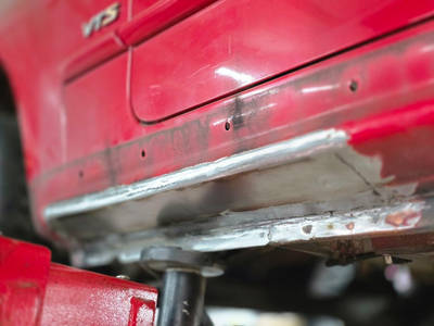 Laswerk dorpelreparatie & plaatsen gordelbevestiging 10