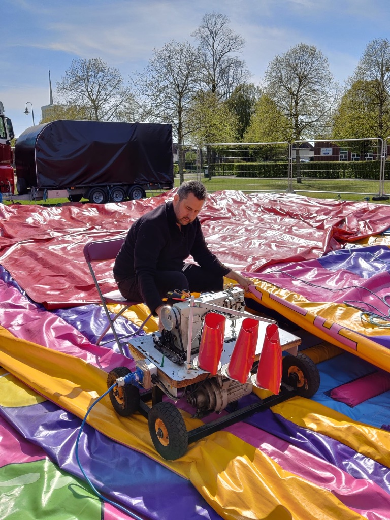 Technician Repairing Inflatable
