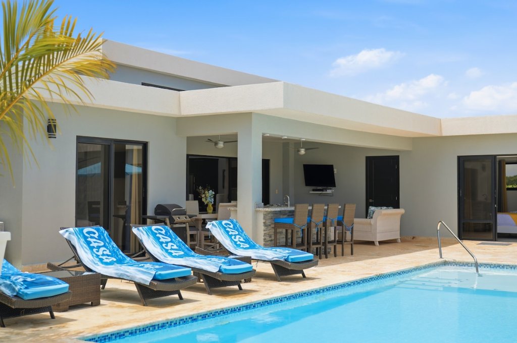 Casa De Sol luxury villa with pool at twilight