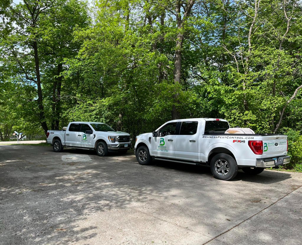 Braness Pest Control technicians and trucks