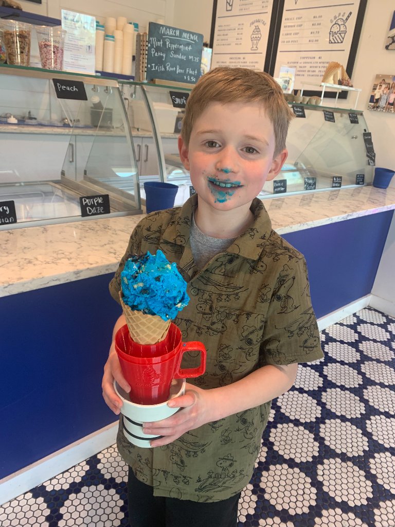 Kid with blue ice cream cone in AutoCone