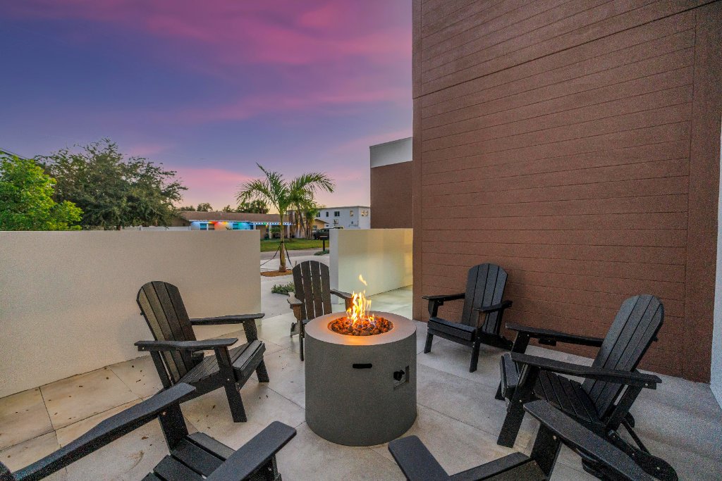 Outdoor patio with fire pit and seating