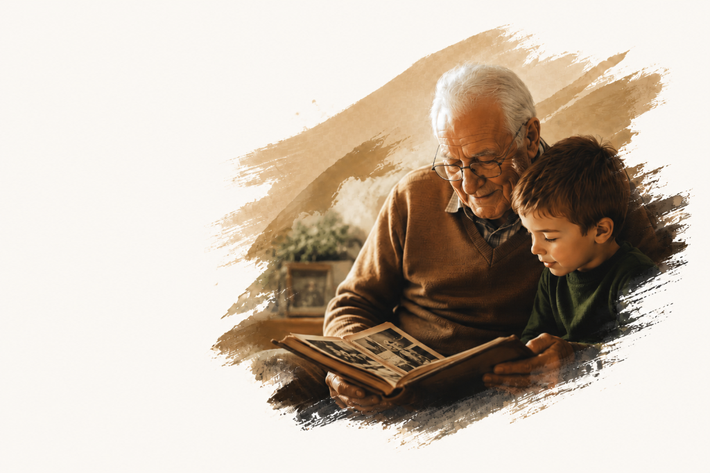 Grandfather and grandson looking through a photo album