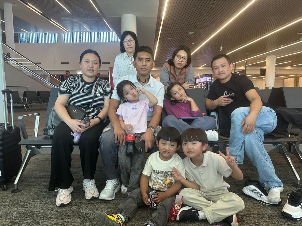 Family Group — Airport Selfie