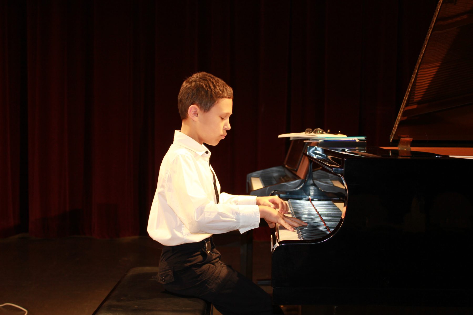 Student performing at the International Piano Competition