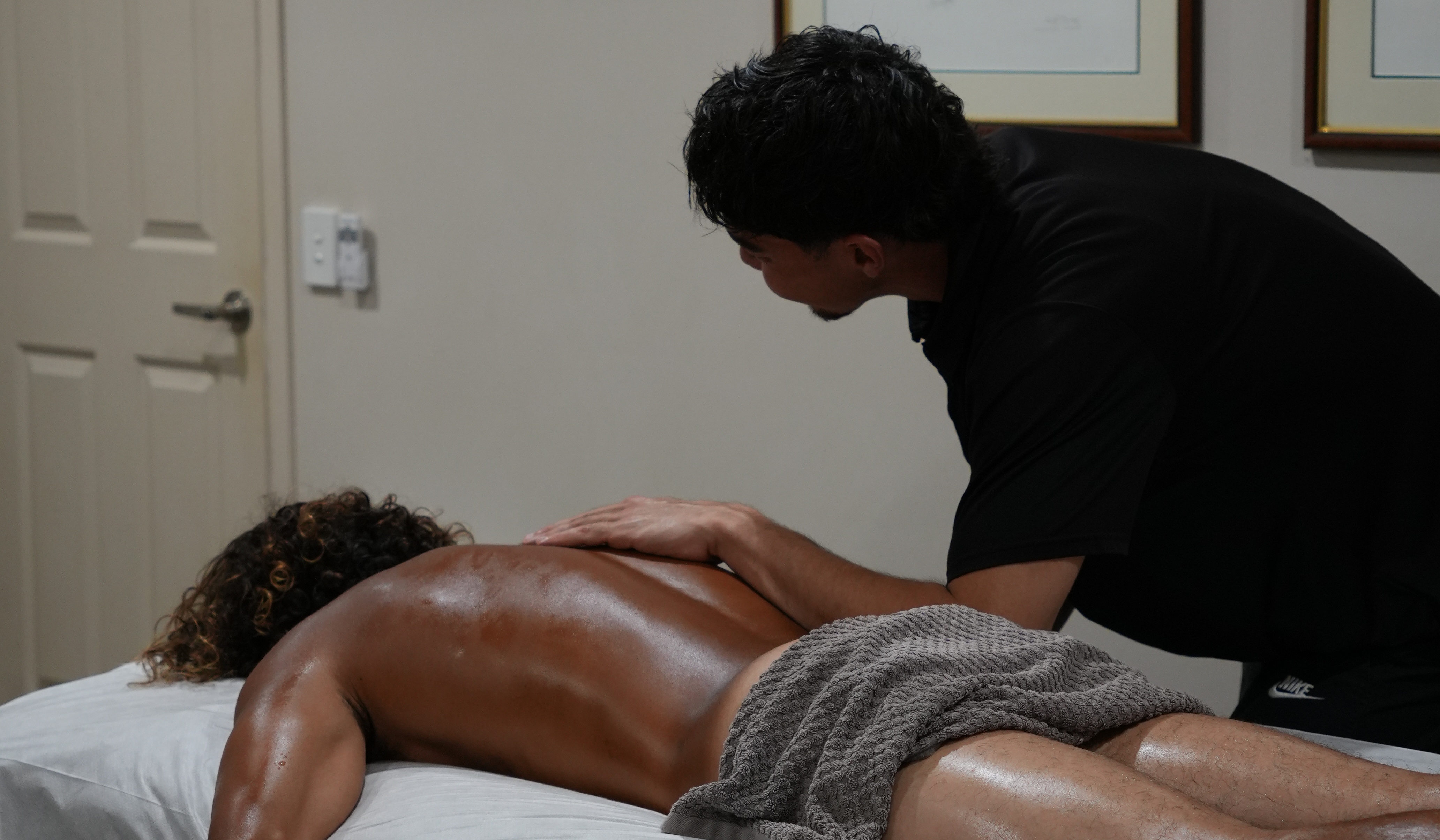 Stephen treating a patient in his clinic