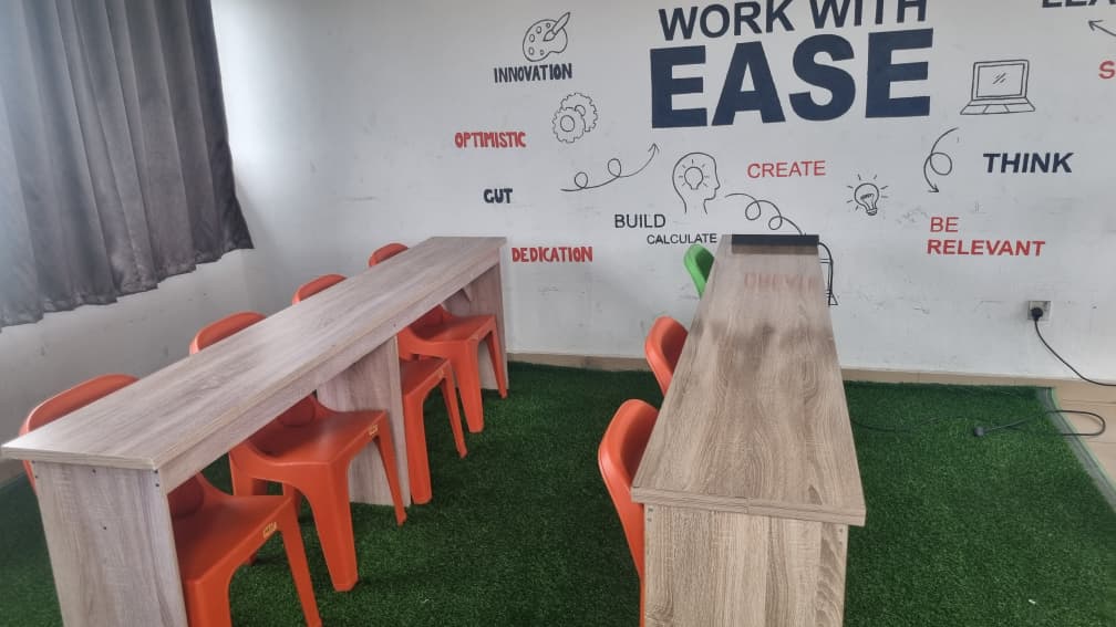 Collaborative workspace with motivational wall art