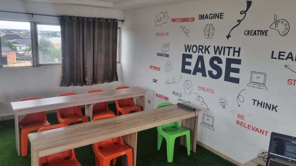 Workspace with desks and vibrant seating