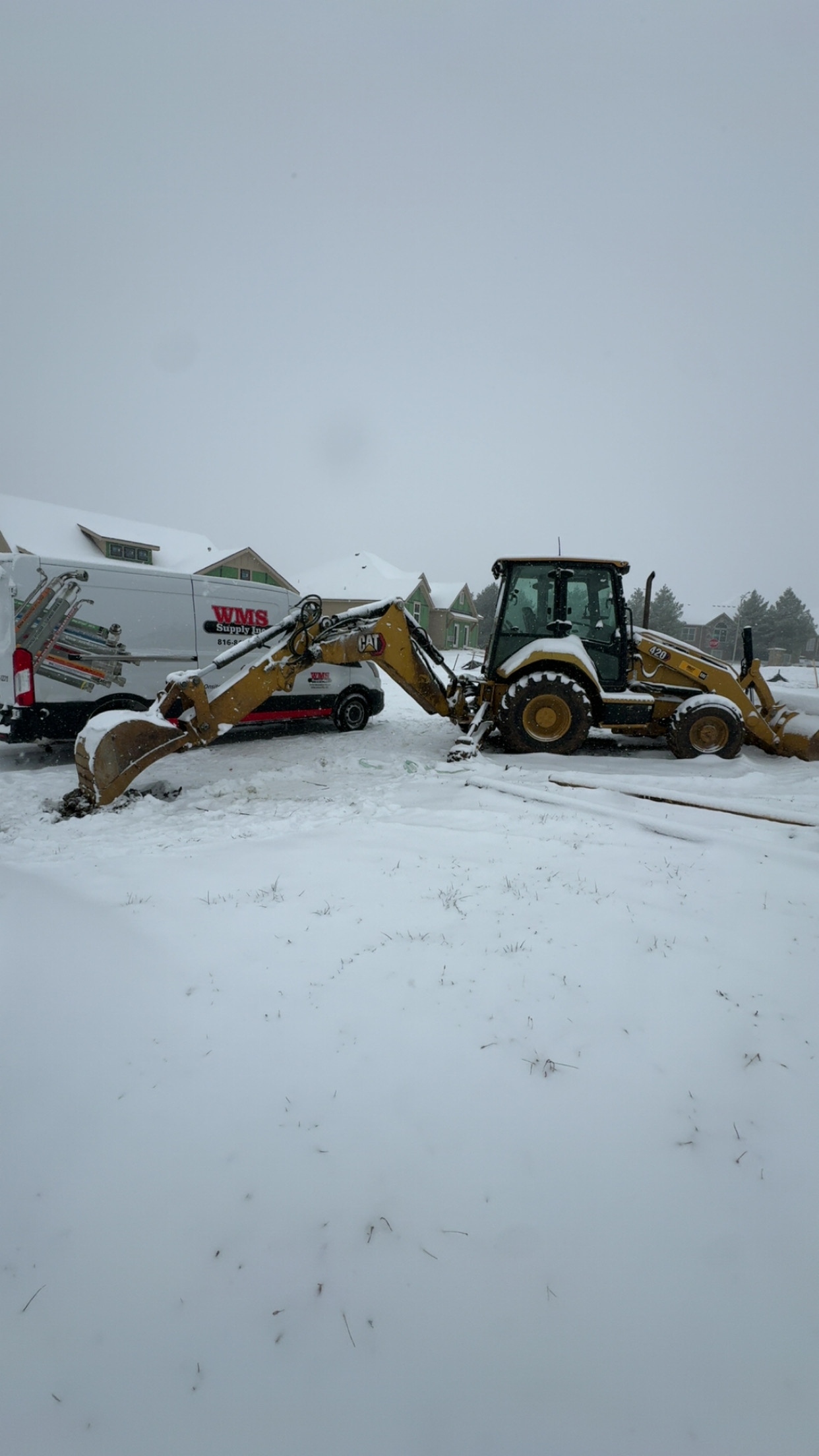 Technician replacing hydraulic hose on equipment