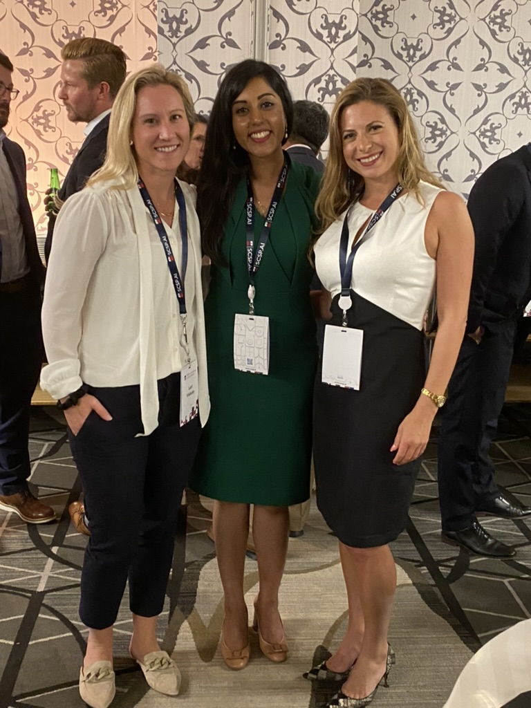 Samantha with alumni at conference