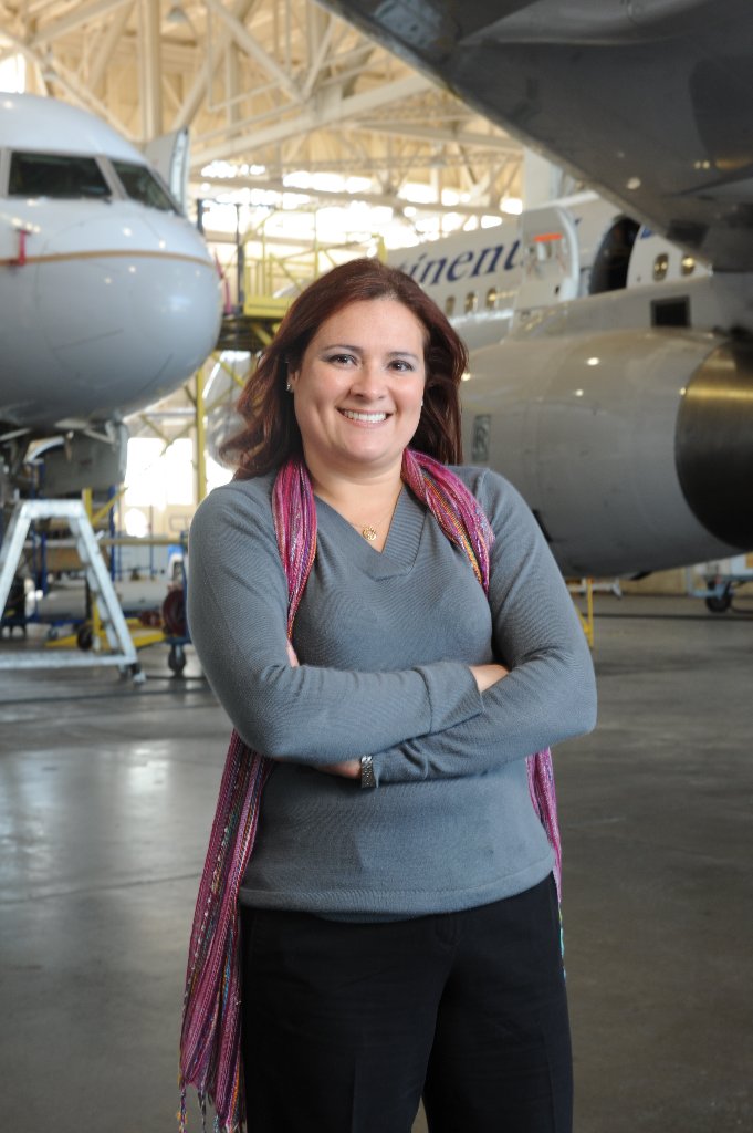 Professional portrait in aircraft hangar
