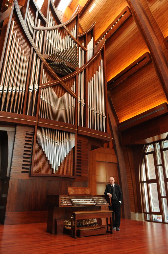 Musician portrait with pipe organ