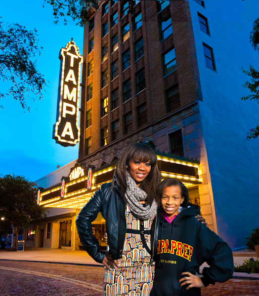 Mother and daughter portrait in front of Tampa Theatre