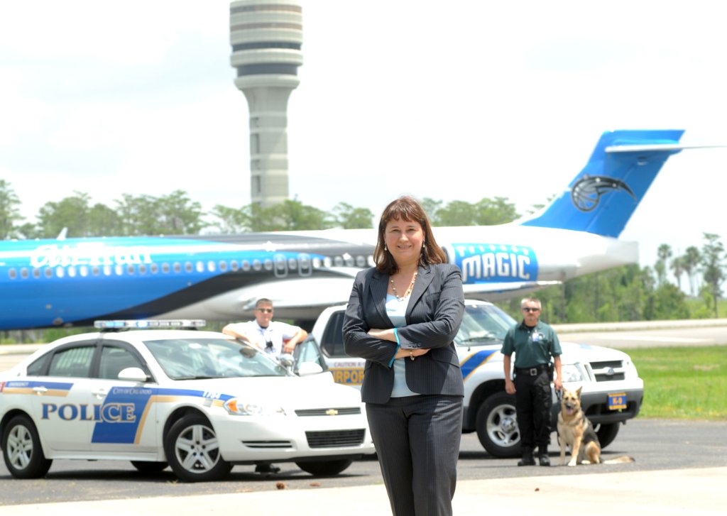 Executive portrait at airport with Orlando Magic aircraft