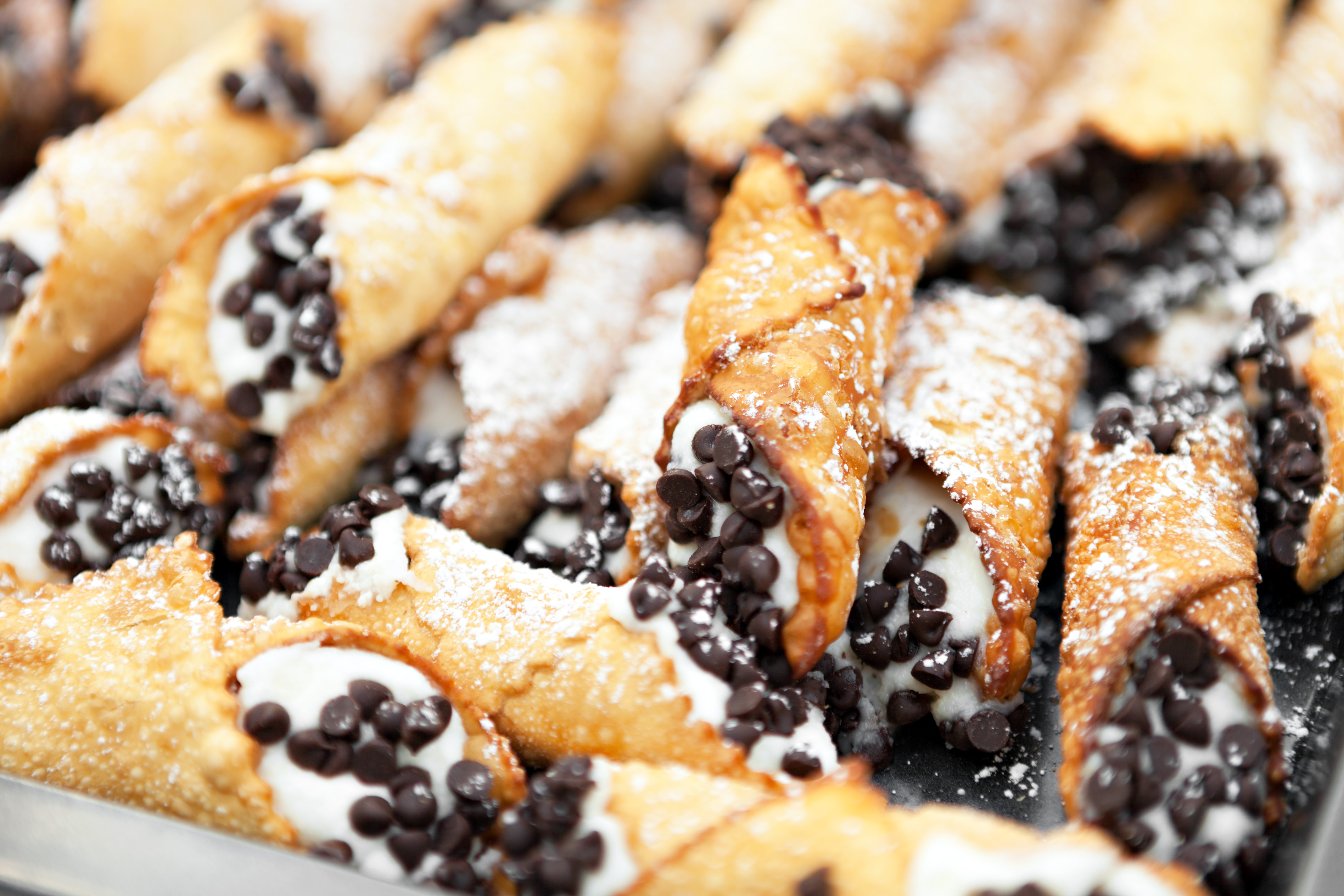 Homemade cannoli with fresh ricotta cream in crispy shells, a dessert option from DiRenzo Brothers Catering in Pittsburgh