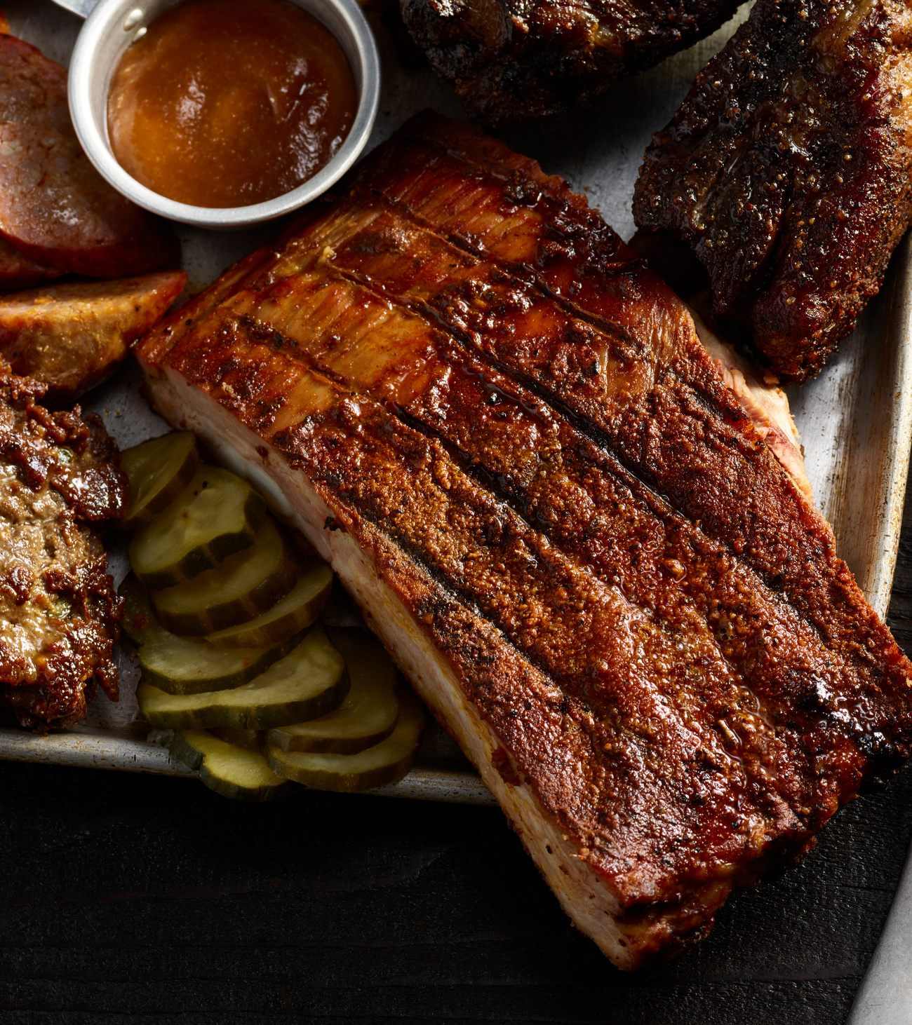 Pittsburgh-style BBQ tailgate platter with smoked meats, catered by DiRenzo Brothers Catering for game-day events