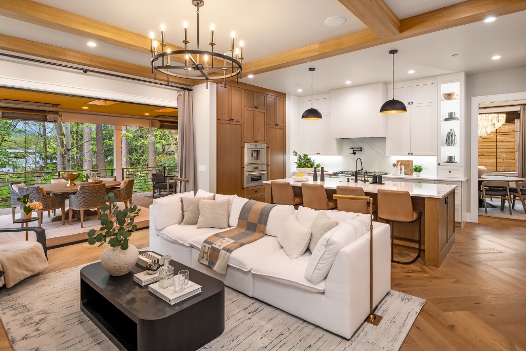 Open-plan whole-home remodeling project by FameLux Builders