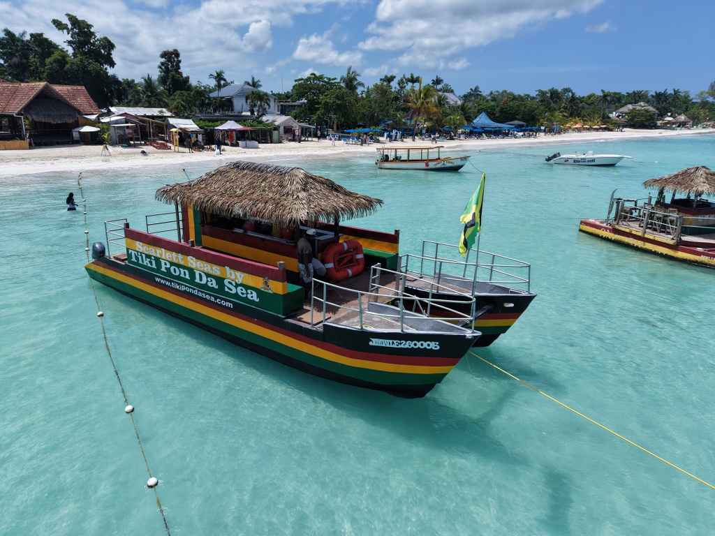 Tiki Pon Da Sea boat on the crystal clear waters of Negril Jamaica