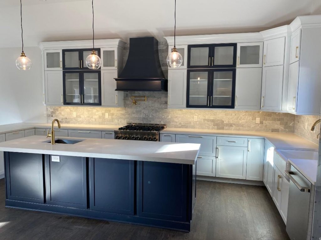 Navy & White Kitchen with Stone Backsplash
