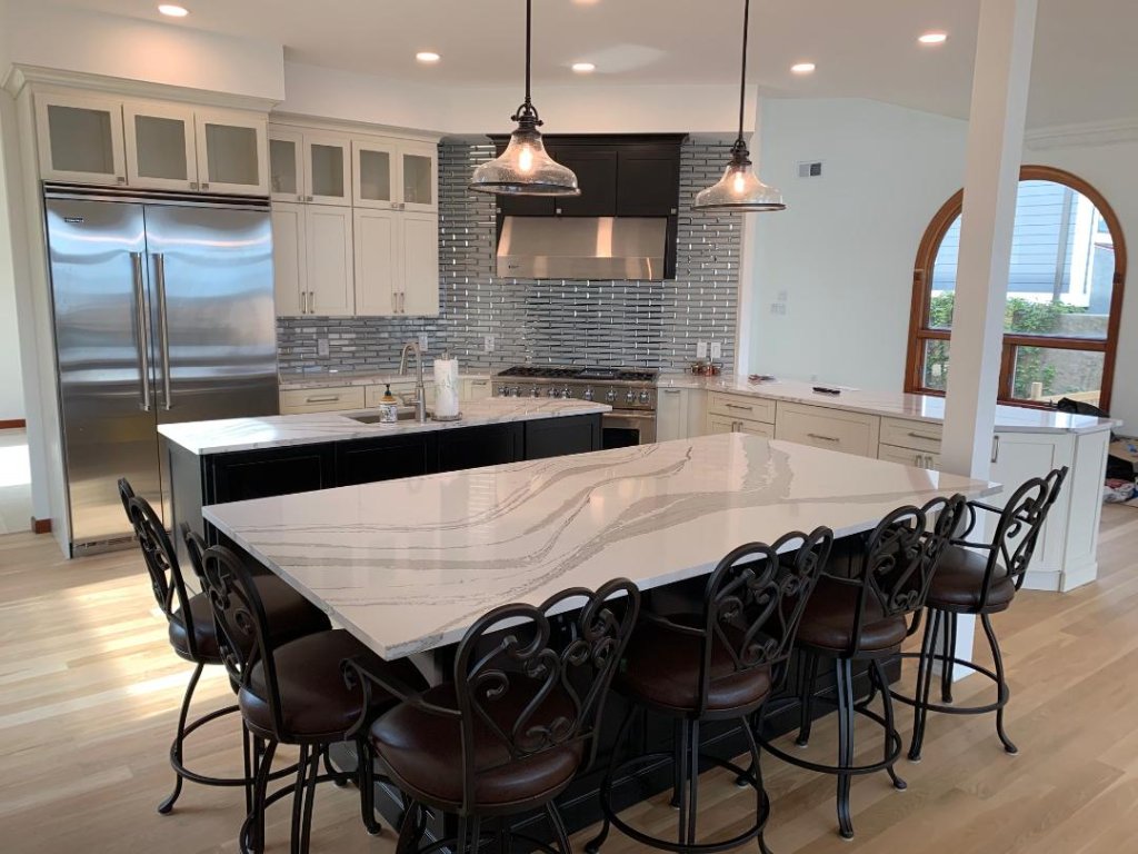 Bright White Kitchen with Arabesque Backsplash