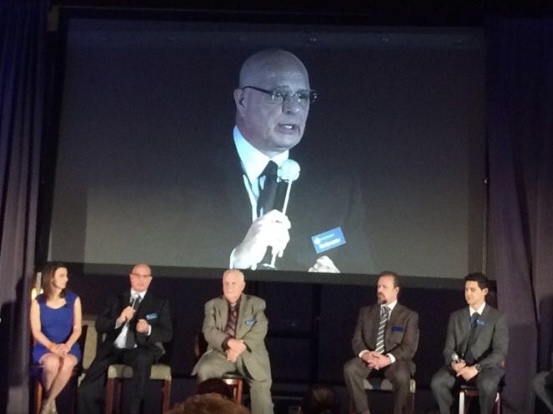 Ron Bonnstetter seated on a panel discussion at a TTI conference
