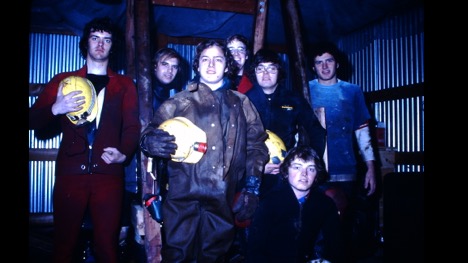 Vintage group photo of cave explorers in protective gear