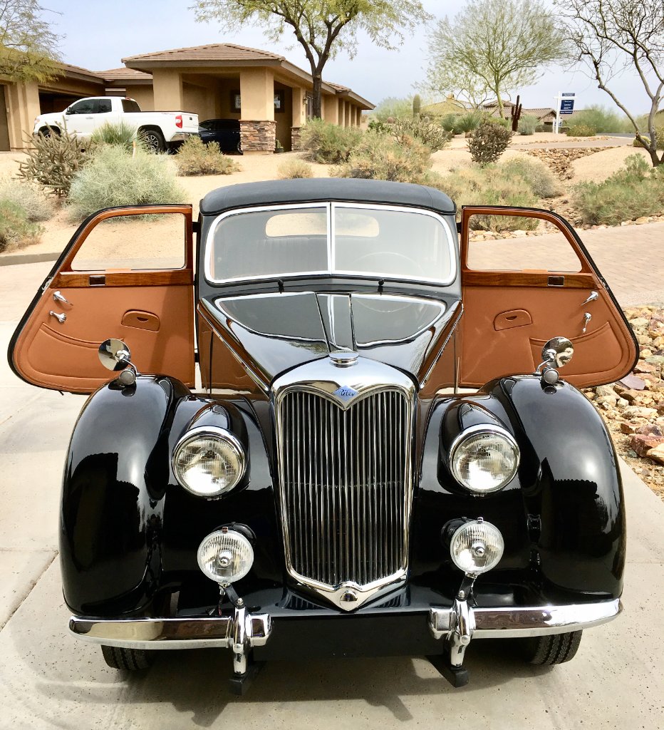 1951 Riley RMB 2.5-liter with both front doors open on a driveway