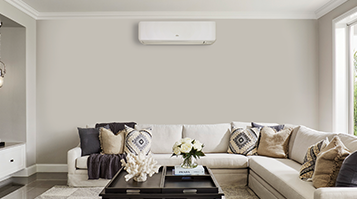 Modern heat pump unit installed on a home exterior wall