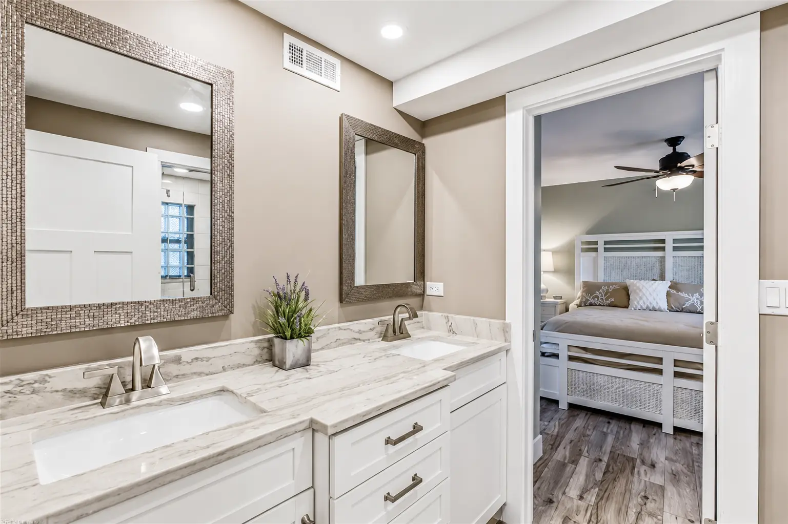 Renovated master bathroom with double vanity at Bottlenose Pointe Marco Island vacation rental