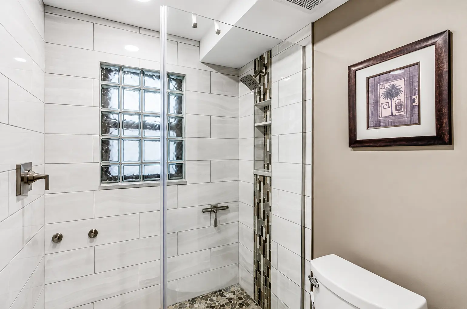 Walk-in tiled shower at Bottlenose Pointe Marco Island condo rental bathroom
