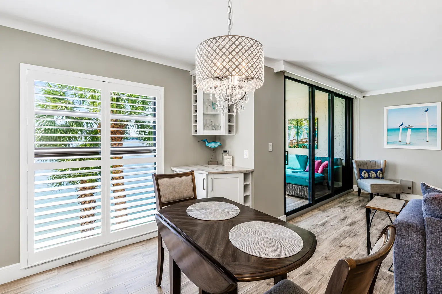 Dining area with chandelier at Bottlenose Pointe vacation rental Marco Island Florida