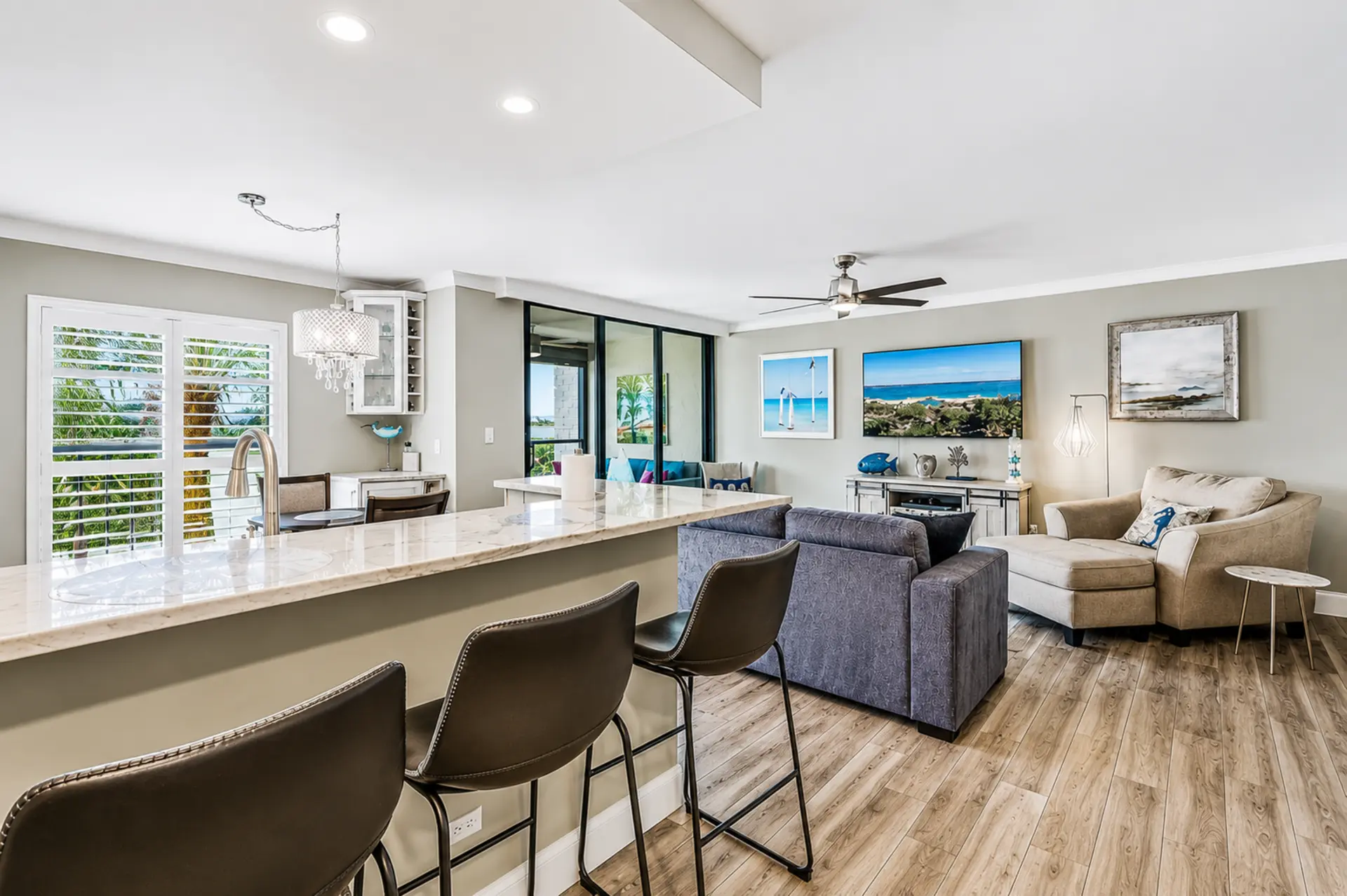 Kitchen bar stools and open floor plan at Bottlenose Pointe Marco Island vacation rental