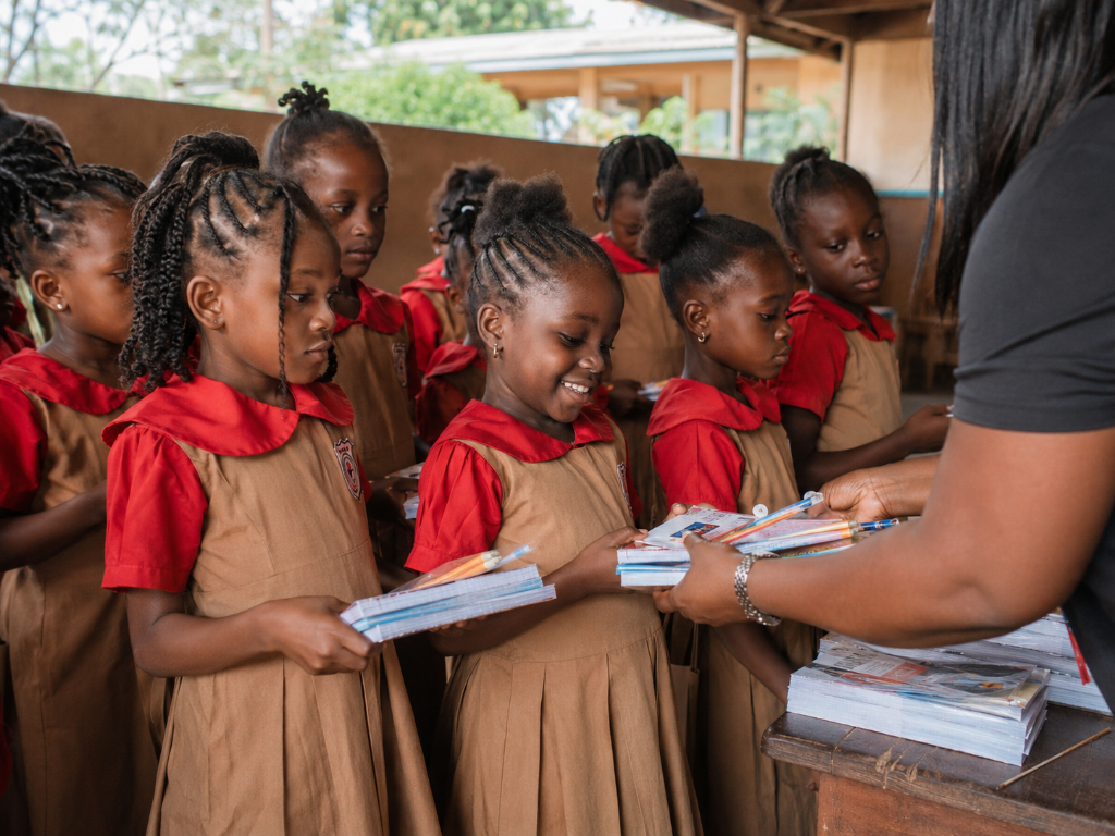 Students receiving school supplies
