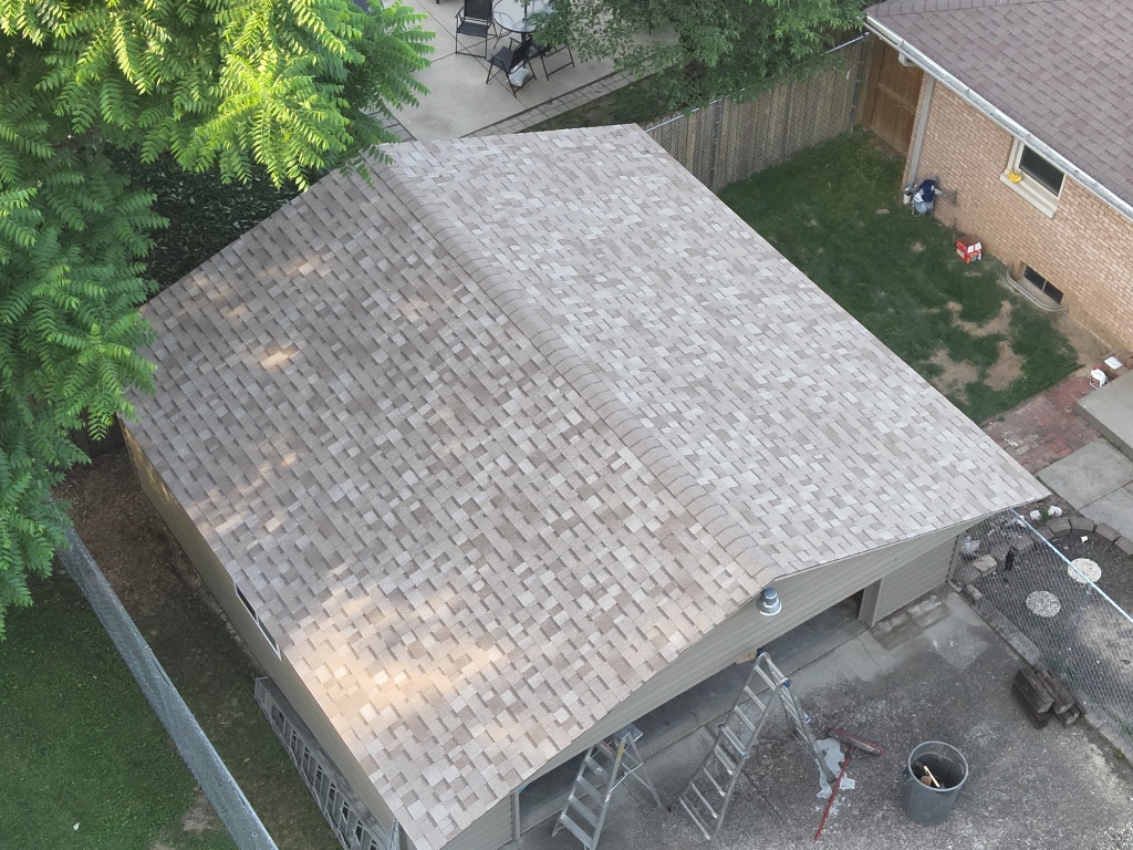 Aerial view of completed shingle roof installation by Big Dawg Roofing
